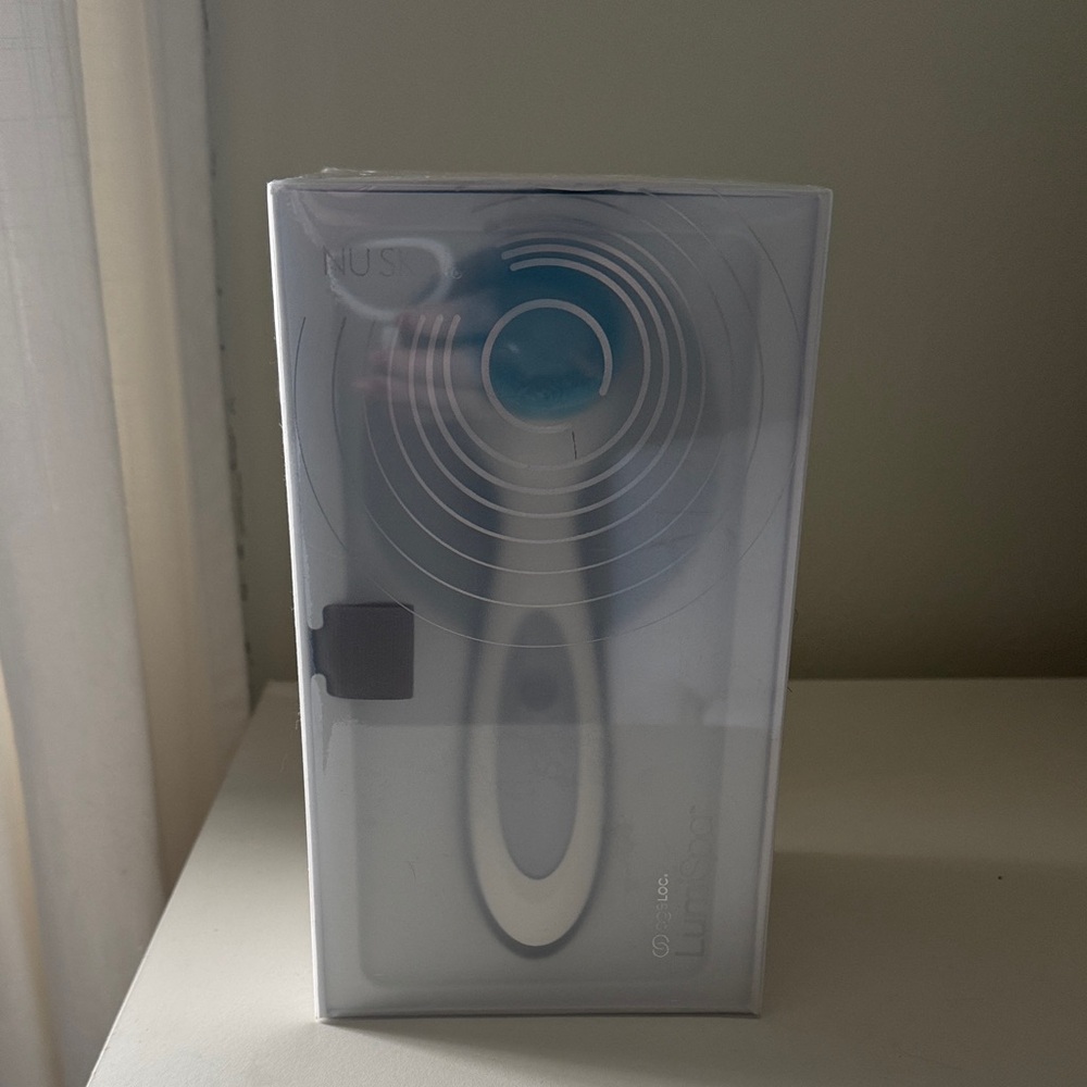 Blue and White Facial Cleansing Brush